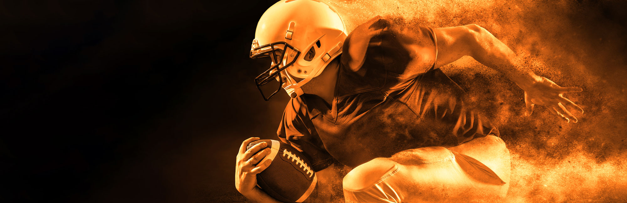 Dynamic football player in motion, engulfed in fiery energy, symbolizing speed, power, and intensity on a synthetic turf field
 football-fire.jpg