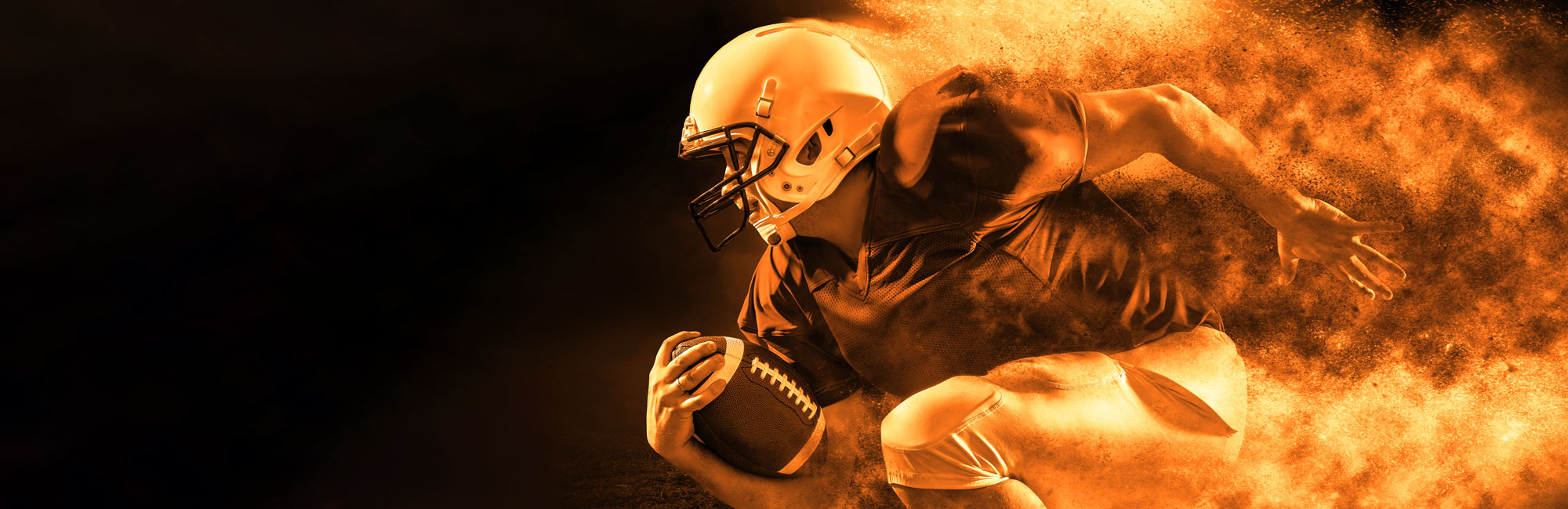 Dynamic football player in motion, engulfed in fiery energy, symbolizing speed, power, and intensity on a synthetic turf field