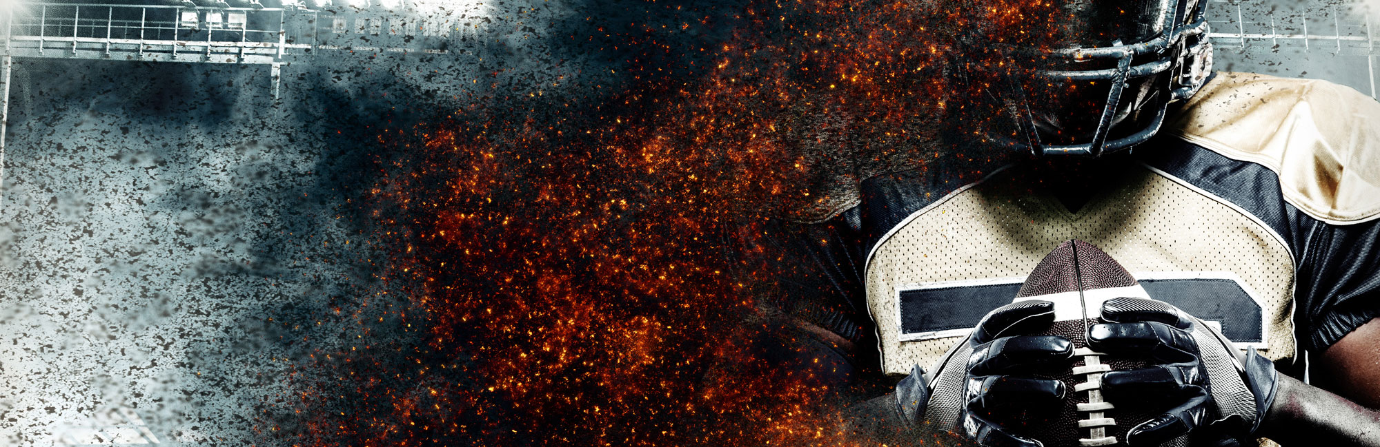 American football player in full gear gripping a football, with a dramatic explosion effect in the background. The image symbolizes intensity, power, and the high-impact nature of the game played on durable synthetic turf field